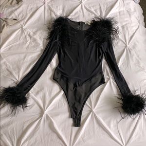 Incredible mesh bodysuit with feather detail